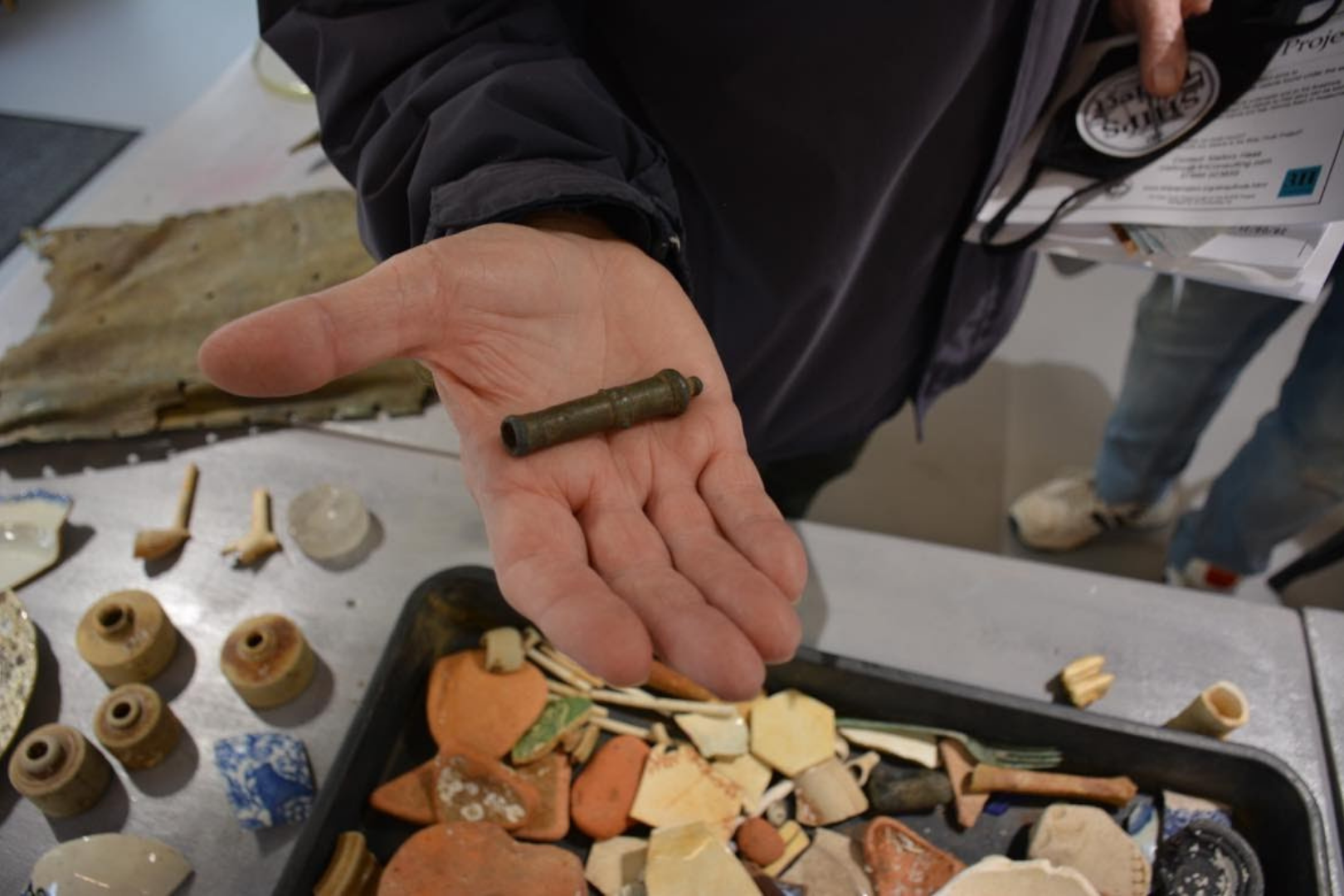 Divers find of a small toy bronze cannon recovered from the old Plymouth Pier site Photo credit Mallory Haas